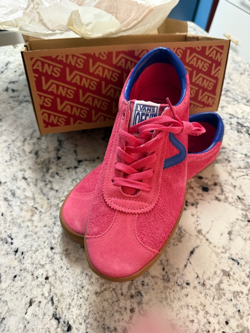 Vans Bright Pink Suede Sneakers with Blue Trim.